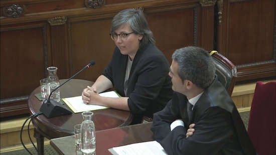 Mireia Boya and her lawyer in the witness stand at the Supreme Court